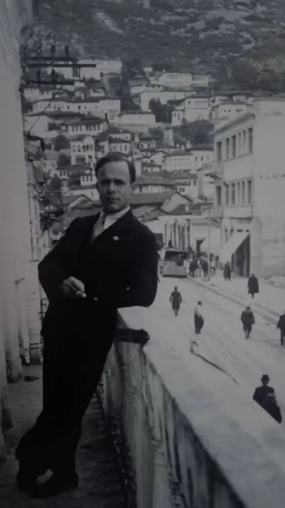 Izedin Vrioni on a balcony overlooking Berat, circa 1930s